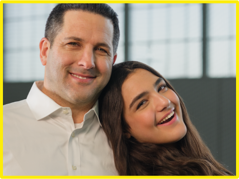 Adam Schefter and his daughter smiling